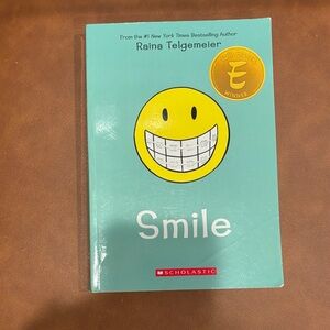 Scholastic Teal and Yellow Smile Graphic Novel